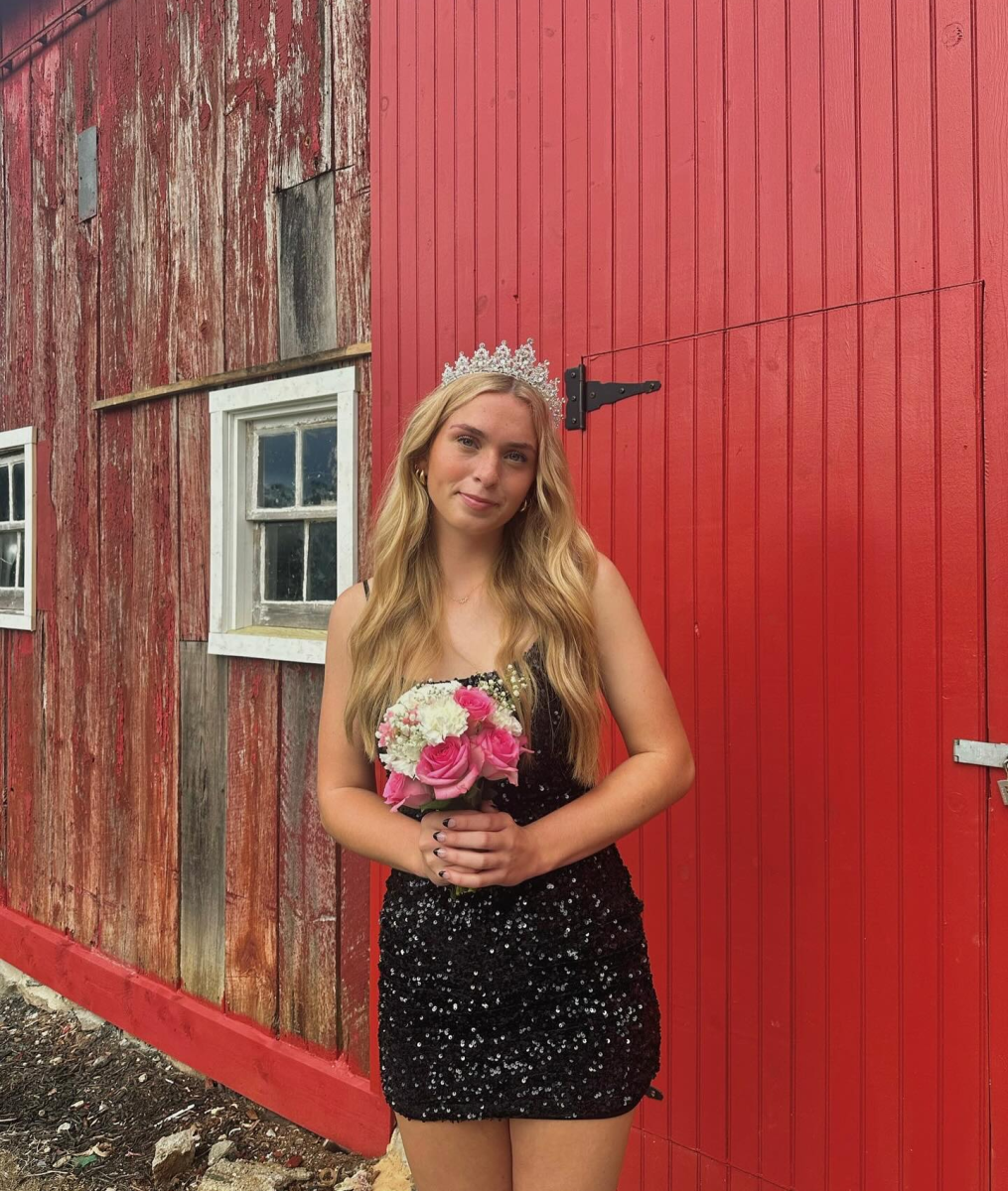 Homecoming Queen Erin Jackson poses prior to the start of the homecoming dance. 
Photograph by Anne Jackson 