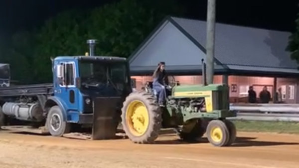 Sophomore Corinne Mummert prepares for a tractor pull run. Photograph Courtesy of Corinne Mummert