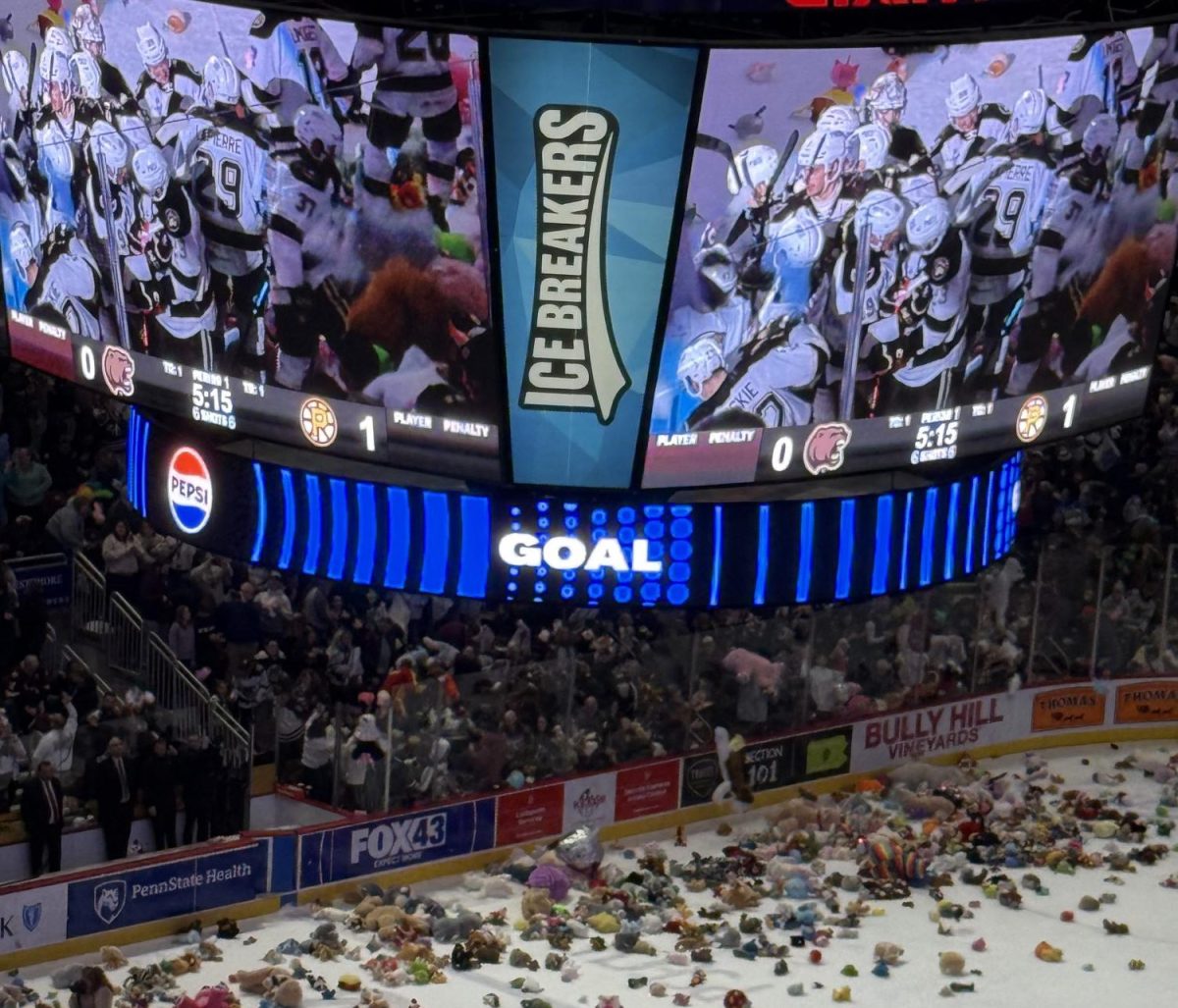 Hershey Bears players can be seen on the big screen celebrating their first goal of the game prompting fans to throw stuffed animals on the ice for their annual "Teddy Bear Toss" on Jan. 5. Photograph by Bryleigh Supa