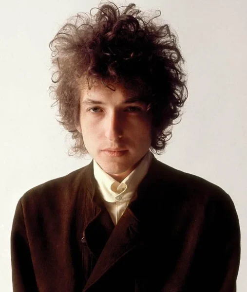 Folk and Rock musician Bob Dylan at a professional photoshoot, 1965. Courtesy of @Hair via Reddit