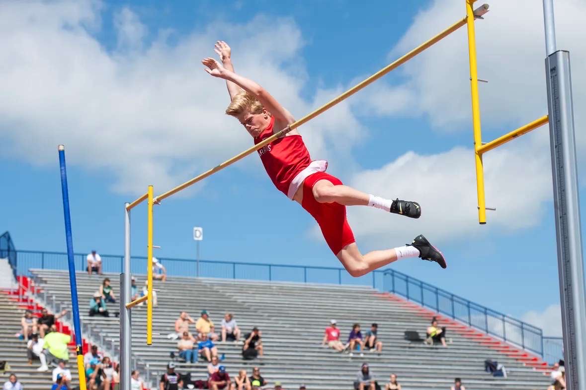 Junior Patrick O'Brien flying over the bar at the PIAA District 3 meet.