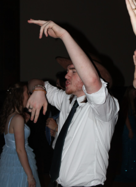 Senior Henry Debeaumont busting it down groovy-style on the dance floor during prom.

Debeaumont believes that everyone should be able to dance freely. “Dancing feels like such a freeing thing that a person can ever do,” Debeaumont said.