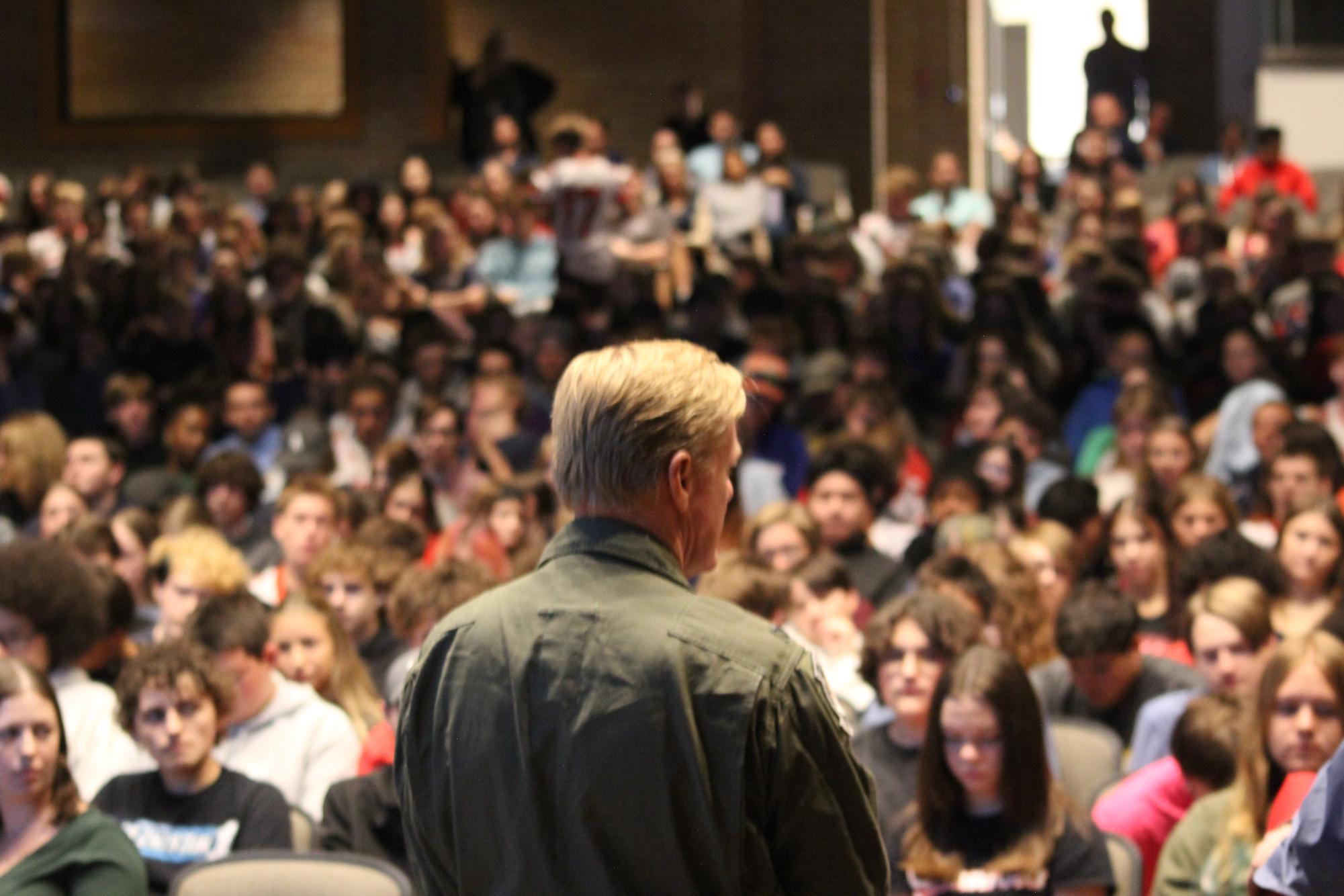 Students watch as McCarthy greets the audience. The speech aimed to inspire students through a message of resilience and self-discovery, which McCarthy learned as part of his career in the Air Force. Photograph by Josie Witsik