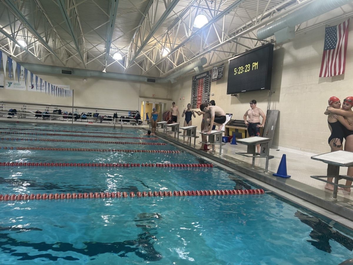 Sophomore Chase Markel ready to dive at the Shrewsbury YMCA pool. Photograph courtesy of Summer Yingling