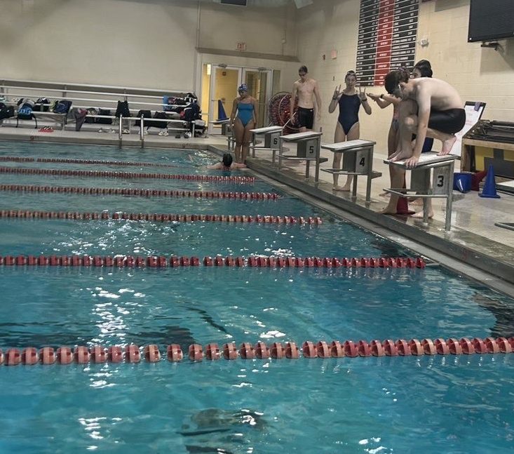 Sophomore Chase Markel ready to dive at the Shrewsbury YMCA pool. Photograph courtesy of Summer Yingling
