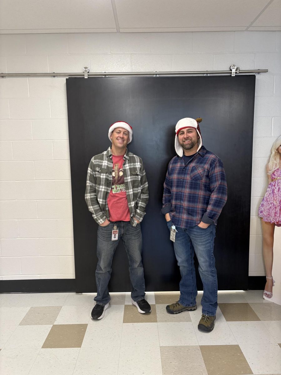 Longtime friends and art teachers Wade Bowers and Wesley Myers show off their fits on ‘Holiday Gear’ day on Dec. 22. The Susquehannock community loves to see the bromance between Mr. Bowers and Mr. Myers as they continue to unintentionally match outfits for the rest of the week, while still showing their school spirit. Photograph by Caroline Simpson