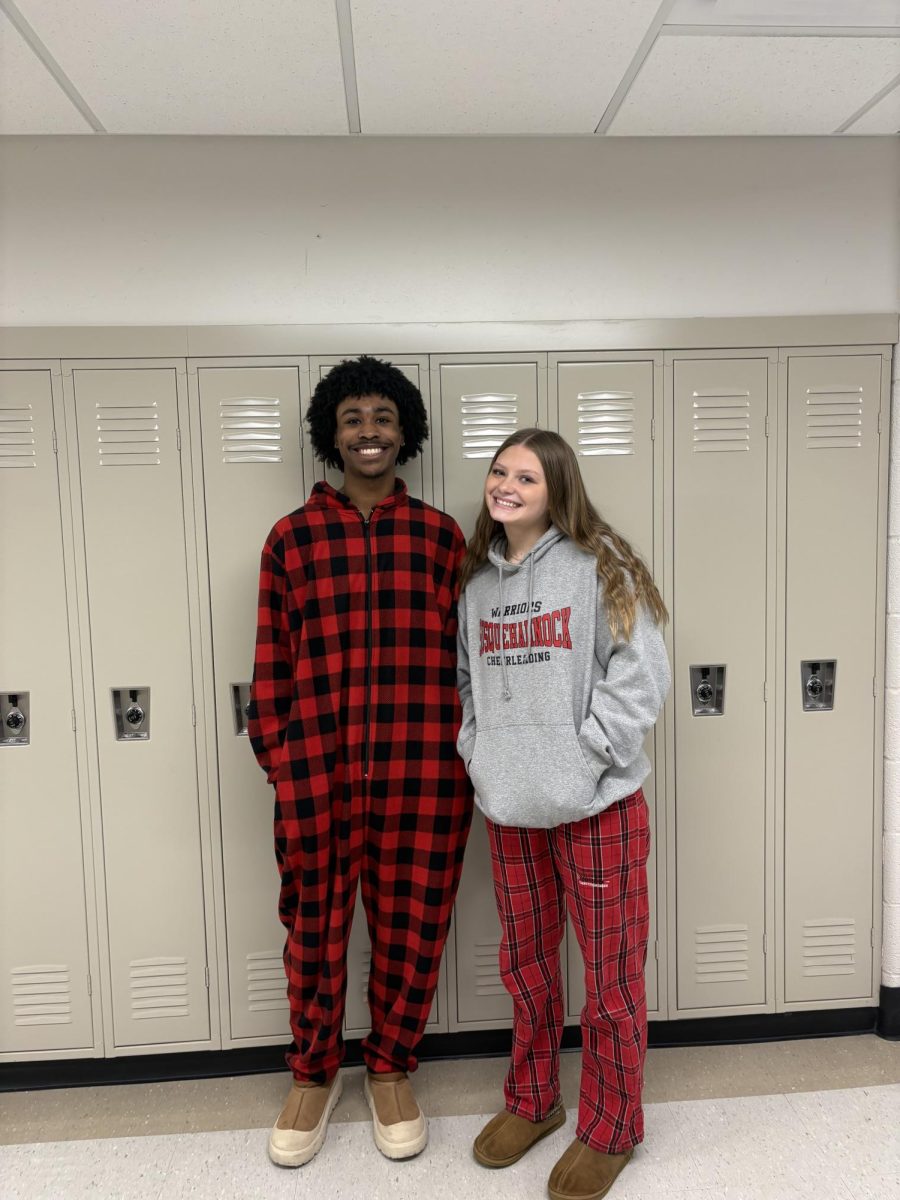 Pajama day? Or, just rolled out of bed day? Senior Kaden Richardson and junior Bella Bauer take advantage of ‘Pajama Day’ and dress in their comfiest! Kaden and Bella prove that one does not have to put in a lot of effort in order to spread and be a part of school spirit. 
Photograph by Caroline Simpson