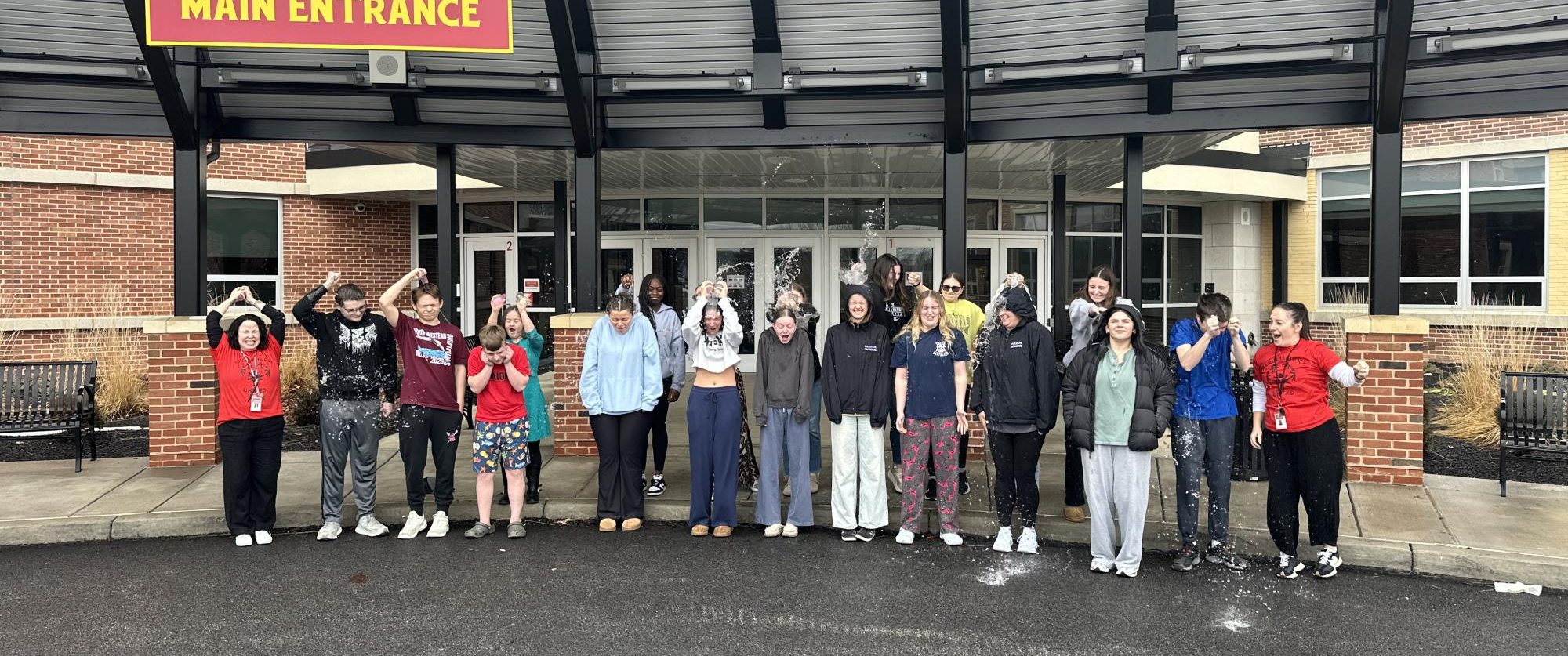 The Unified Club pops cold water balloons above their heads to raise money for Special Olympics Pennsylvania. Photograph Courtesy of Emily Hedrick