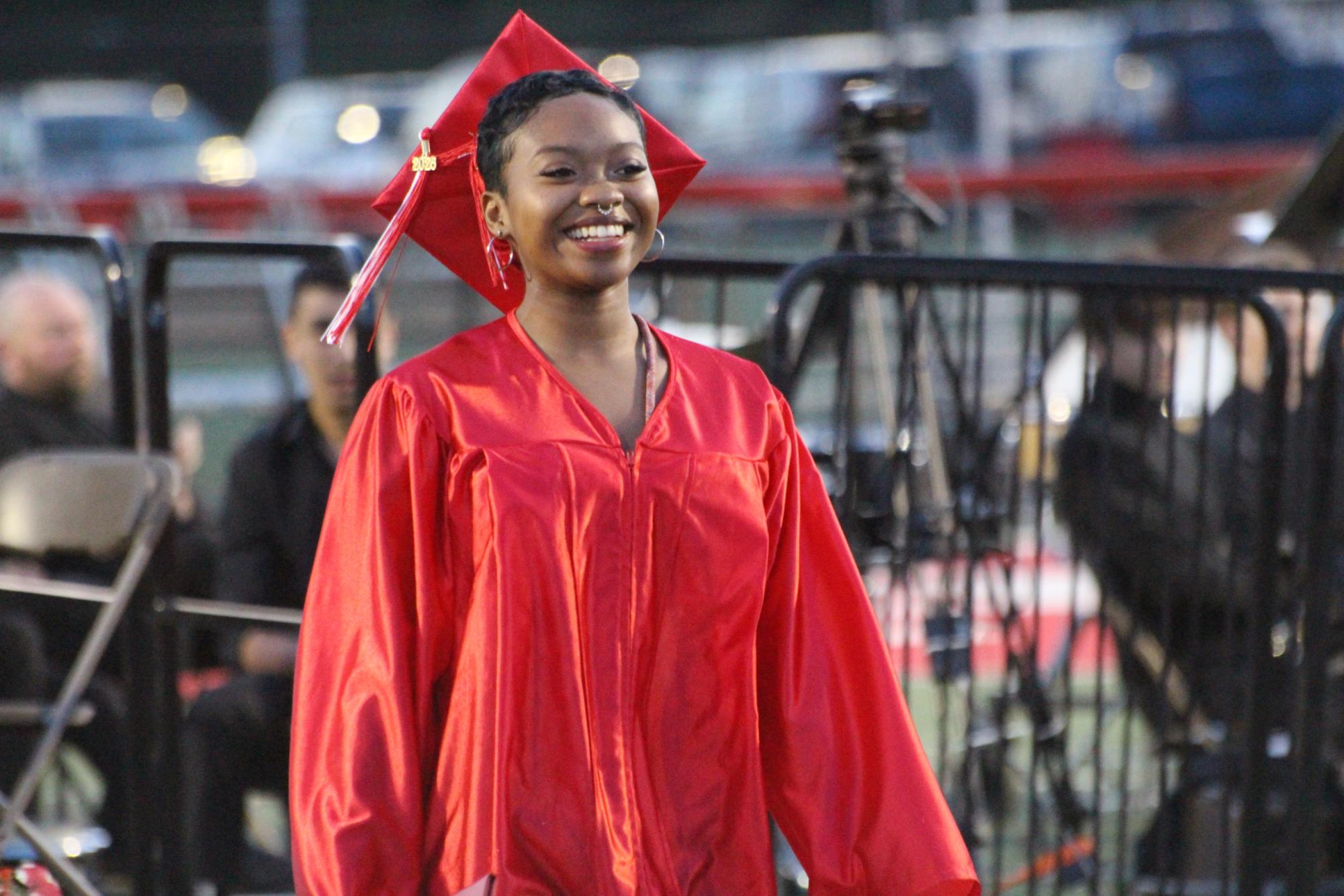 Senior Layla Holmes is all smiles after receiving her diploma. Photograph by Tim Hare