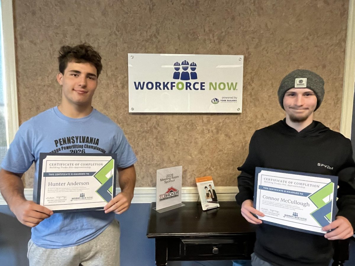 Juniors Hunter Anderson and Connor McCullough pose with their graduation certificates for the York Builders Association Pre-Apprenticeship Program. Photograph Courtesy of Mathew Amberman